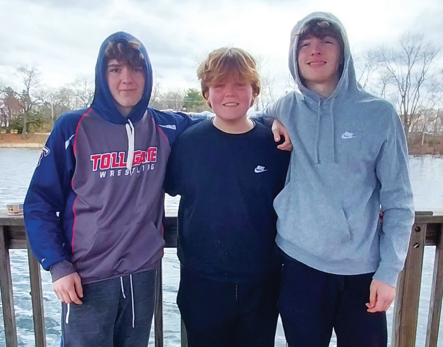 SLOW BITE: Anglers George Homes, Jr., Reece Quinn and Even Oldrid ,Tollgate High School students, said the trout bite at Gordon’s Pond slowed Saturday morning as a weather front moved in. (Submitted photos)